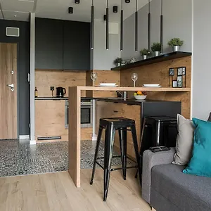 Wola Loft Апартаменты